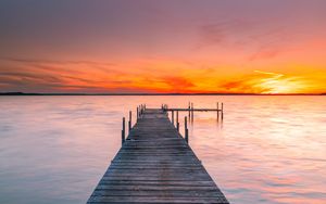 Preview wallpaper pier, sea, sunset, horizon, sky, water