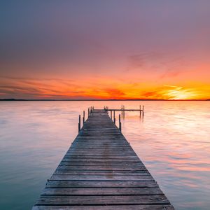 Preview wallpaper pier, sea, sunset, horizon, sky, water