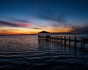 Preview wallpaper pier, sea, sunset, horizon, dark