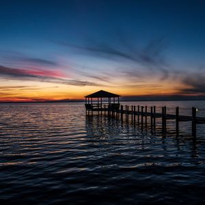 Preview wallpaper pier, sea, sunset, horizon, dark
