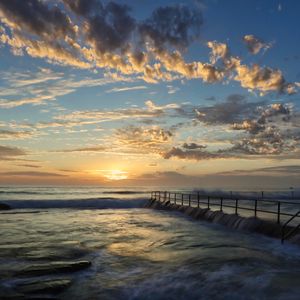 Preview wallpaper pier, sea, waves, landscape, nature, horizon