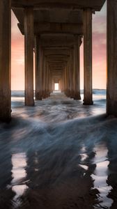 Preview wallpaper pier, sea, waves, pillars, water