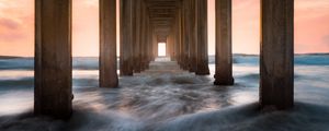 Preview wallpaper pier, sea, waves, pillars, water