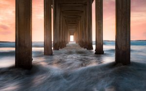 Preview wallpaper pier, sea, waves, pillars, water