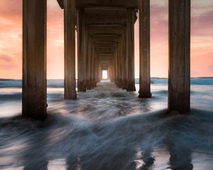 Preview wallpaper pier, sea, waves, pillars, water