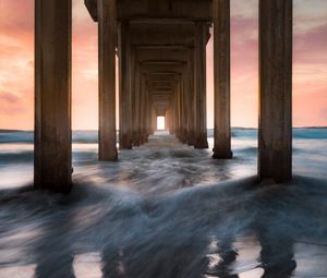 Preview wallpaper pier, sea, waves, pillars, water