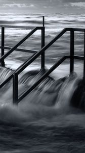 Preview wallpaper pier, sea, waves, storm, black and white