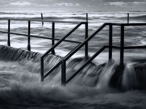 Preview wallpaper pier, sea, waves, storm, black and white