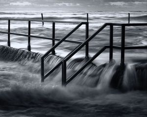 Preview wallpaper pier, sea, waves, storm, black and white