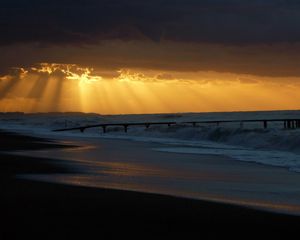 Preview wallpaper pier, sea, waves, light, beams