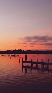 Preview wallpaper pier, silhouette, sunset, lake, loneliness