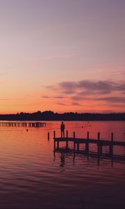 Preview wallpaper pier, silhouette, sunset, lake, loneliness