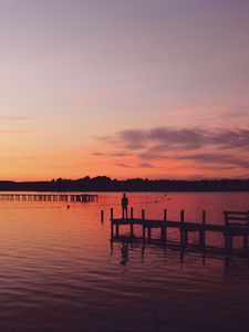 Preview wallpaper pier, silhouette, sunset, lake, loneliness