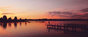 Preview wallpaper pier, silhouette, sunset, lake, loneliness