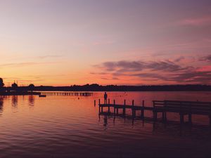 Preview wallpaper pier, silhouette, sunset, lake, loneliness