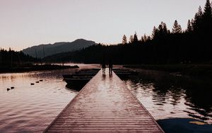 Preview wallpaper pier, silhouettes, dark, river, dusk