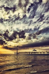 Preview wallpaper pier, sky, clouds, colors, paints, coast, evening