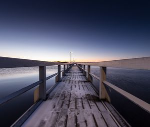 Preview wallpaper pier, snow, bridge, sunset, helsinki, finland