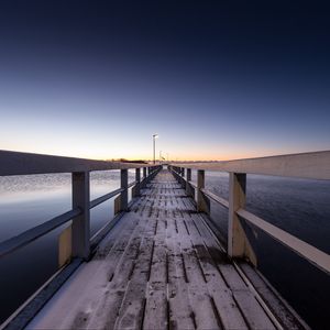 Preview wallpaper pier, snow, bridge, sunset, helsinki, finland