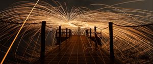 Preview wallpaper pier, sparks, freezelight, long exposure, light