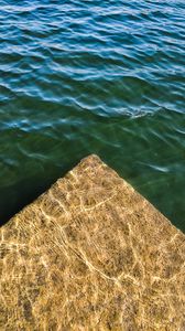 Preview wallpaper pier, stone, water, glare