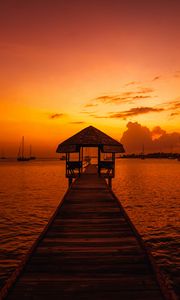 Preview wallpaper pier, structure, sea, boats, sunset, dark