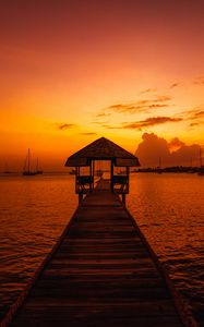 Preview wallpaper pier, structure, sea, boats, sunset, dark