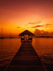 Preview wallpaper pier, structure, sea, boats, sunset, dark