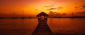 Preview wallpaper pier, structure, sea, boats, sunset, dark