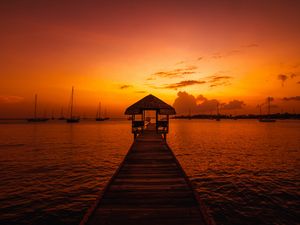 Preview wallpaper pier, structure, sea, boats, sunset, dark