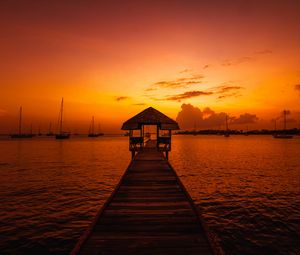 Preview wallpaper pier, structure, sea, boats, sunset, dark