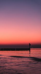 Preview wallpaper pier, sunset, loneliness, sea, horizon