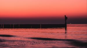 Preview wallpaper pier, sunset, loneliness, sea, horizon