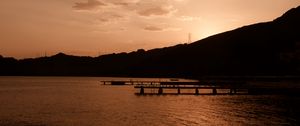 Preview wallpaper pier, sunset, night, sea, monochrome, dark, sky