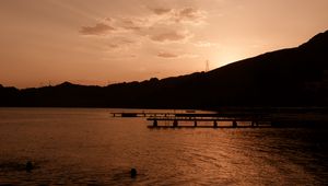 Preview wallpaper pier, sunset, night, sea, monochrome, dark, sky