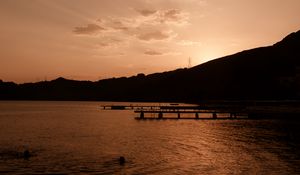 Preview wallpaper pier, sunset, night, sea, monochrome, dark, sky