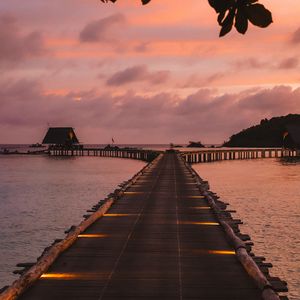 Preview wallpaper pier, sunset, sea, sky