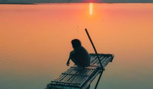 Preview wallpaper pier, sunset, silhouette, lonely, loneliness