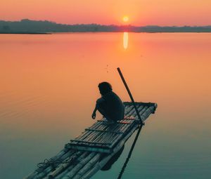 Preview wallpaper pier, sunset, silhouette, lonely, loneliness