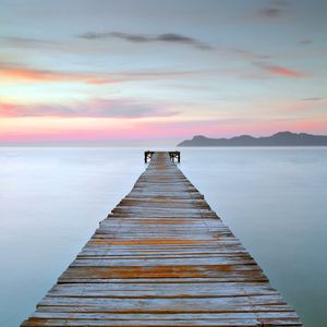 Preview wallpaper pier, water, horizon, sunset