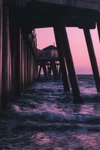 Preview wallpaper pier, waves, sea, water, dusk