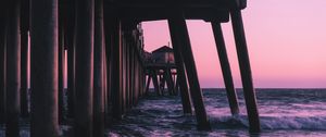 Preview wallpaper pier, waves, sea, water, dusk