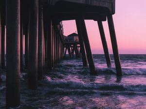 Preview wallpaper pier, waves, sea, water, dusk