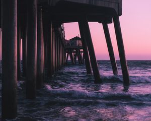 Preview wallpaper pier, waves, sea, water, dusk