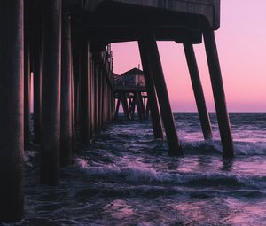 Preview wallpaper pier, waves, sea, water, dusk