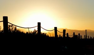 Preview wallpaper pilings, grass, silhouette, dark
