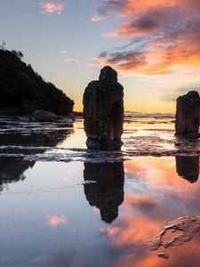 Preview wallpaper pillars, stones, water, reflection, nature, sunset