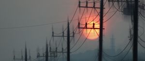 Preview wallpaper pillars, wires, sun, sunset, blur