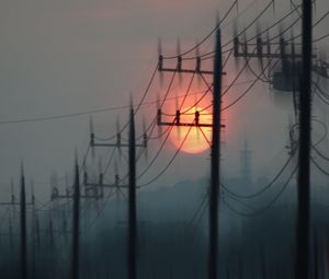 Preview wallpaper pillars, wires, sun, sunset, blur