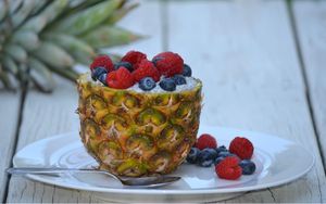 Preview wallpaper pineapple, berries, raspberries, blueberries, dessert